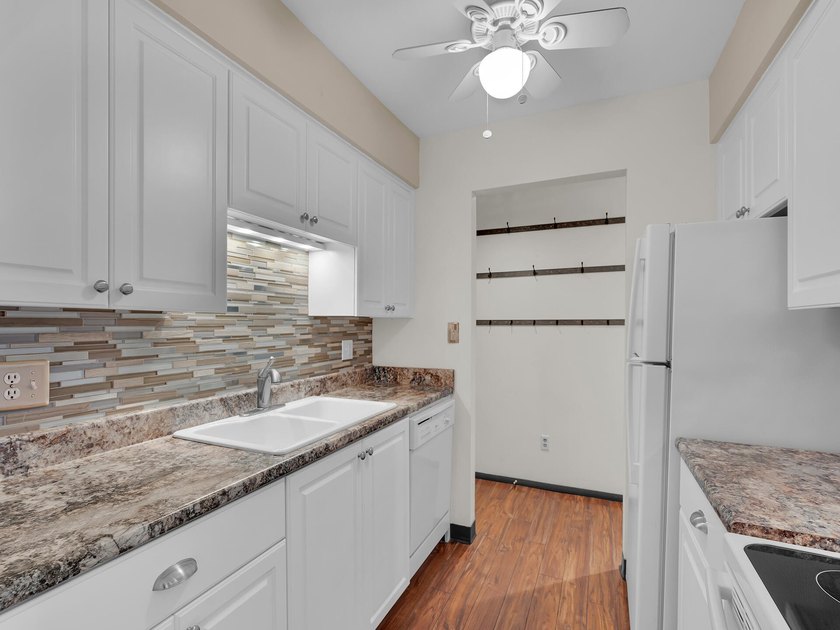 Imagine owning a, low-maintenance condo just a few blocks from - photo 11