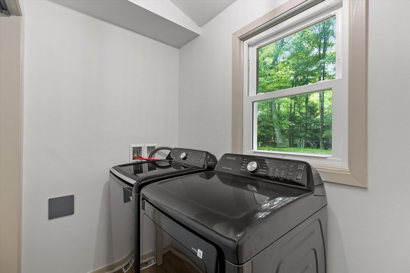 Perched on a private wooded hill with seasonal views of Silver - photo 15