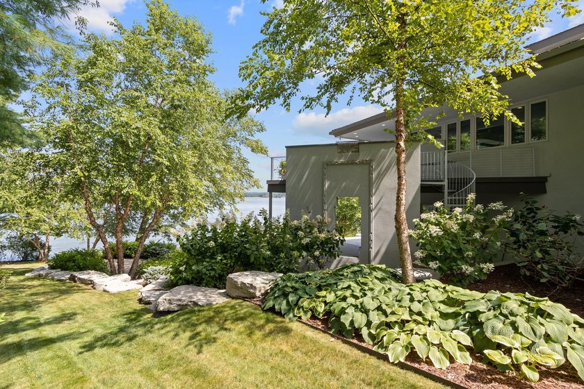 This stunning ranch home, designed by James R. Dresser in the - photo 8