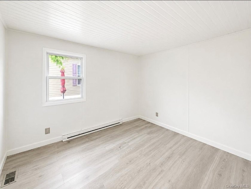 This charming 2-bedroom, 1-bath mobile home is located in a - photo 5