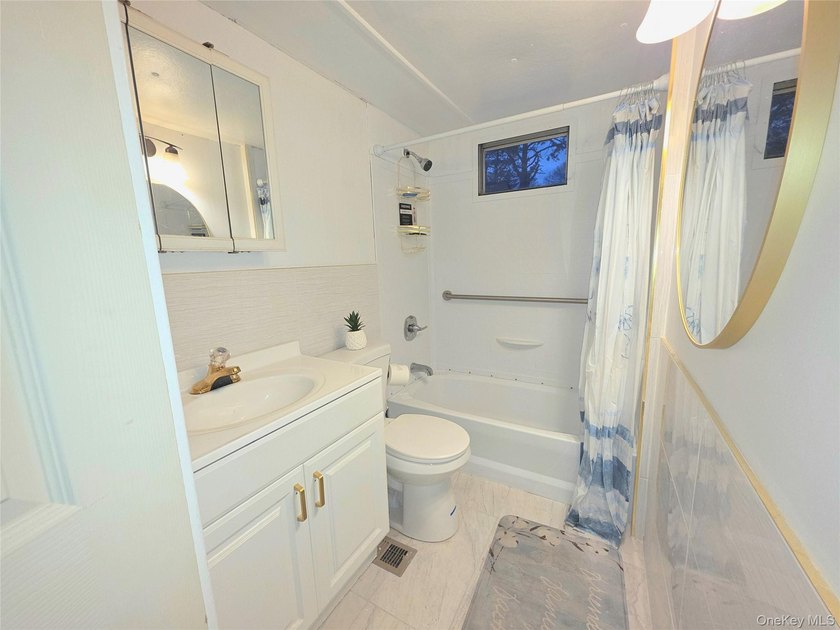 This charming 2-bedroom, 1-bath mobile home is located in a - photo 8