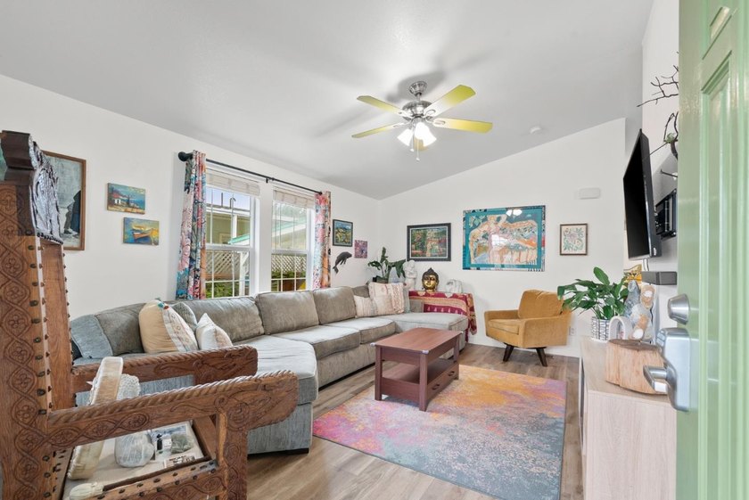 Welcome to your sunny slice of coastal paradise! This bright - photo 3