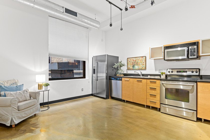 Welcome to the epitome of downtown living! The historic Lowry - photo 7