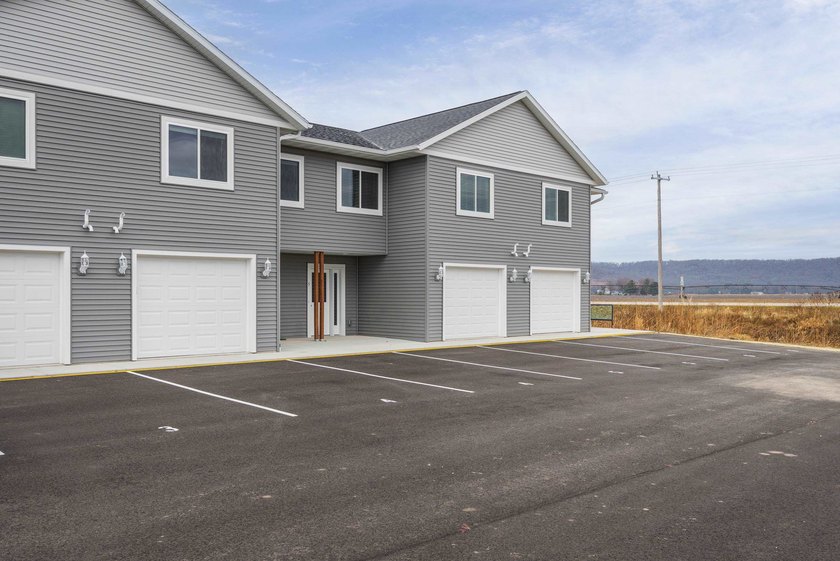 Income~producing 6~unit multifamily property with a balanced - photo 2