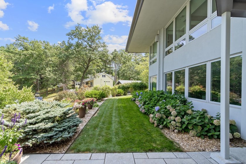 This stunning ranch home, designed by James R. Dresser in the - photo 13