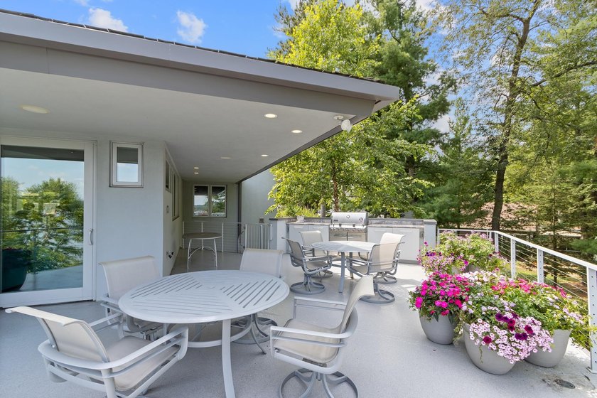This stunning ranch home, designed by James R. Dresser in the - photo 19