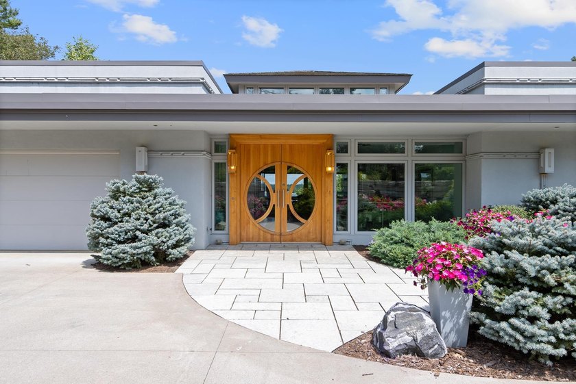 This stunning ranch home, designed by James R. Dresser in the - photo 21
