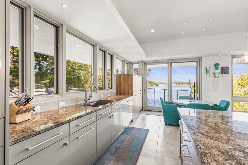 This stunning ranch home, designed by James R. Dresser in the - photo 42