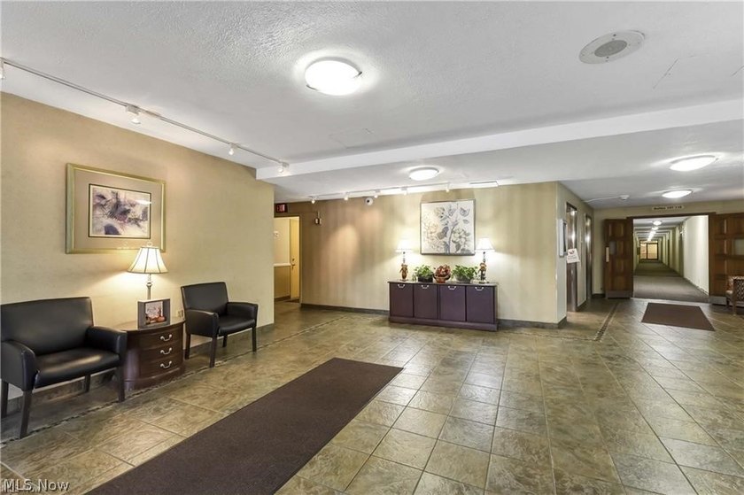 Enjoy effortless high-rise living in this 10th-floor condo at - photo 2