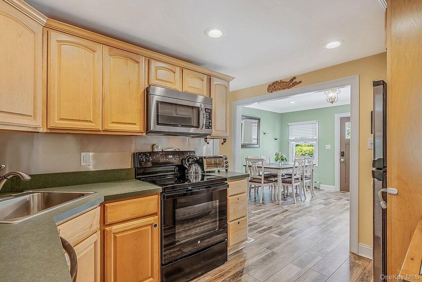 Welcome Home To This Charming Huntington Expanded Cape Nestled - photo 9