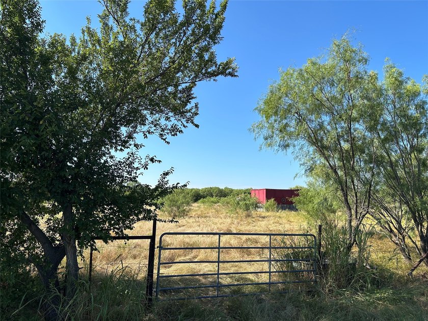 Own a piece of beautiful Texas country! This unique acreage in - photo 3