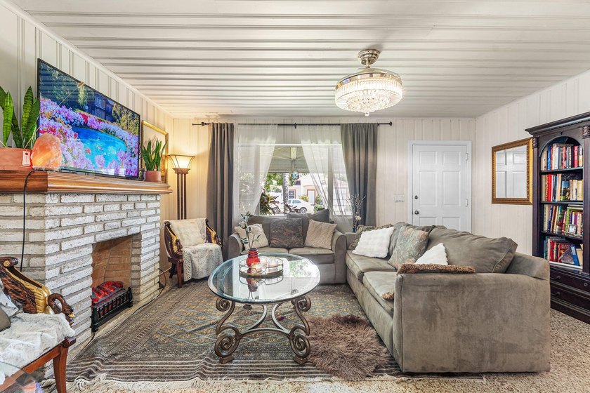 Welcome to this charming single-story residence This - photo 3