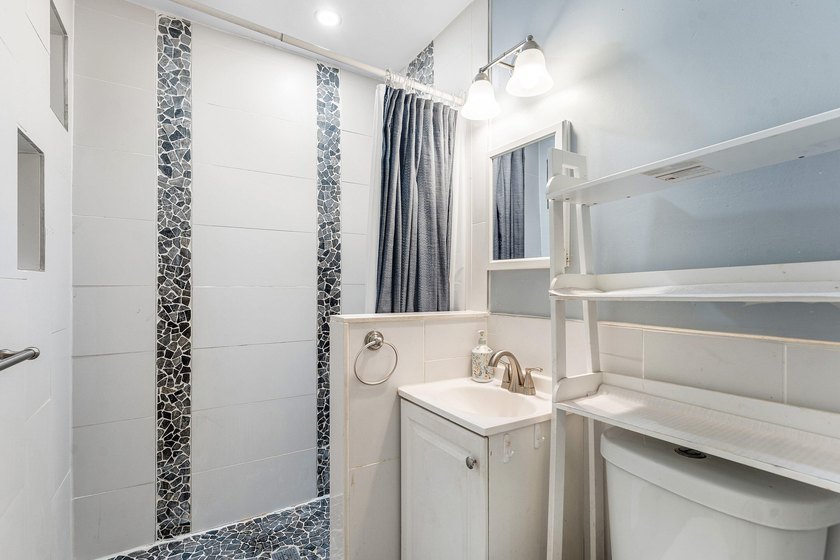 Welcome to this charming single-story residence This - photo 10