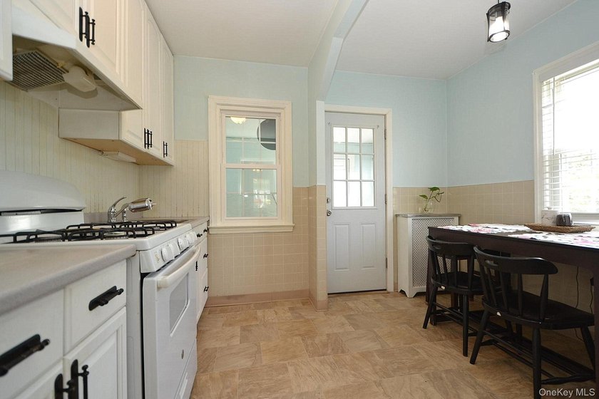 Welcome to this well-maintained 2-bedroom ranch located in the - photo 3