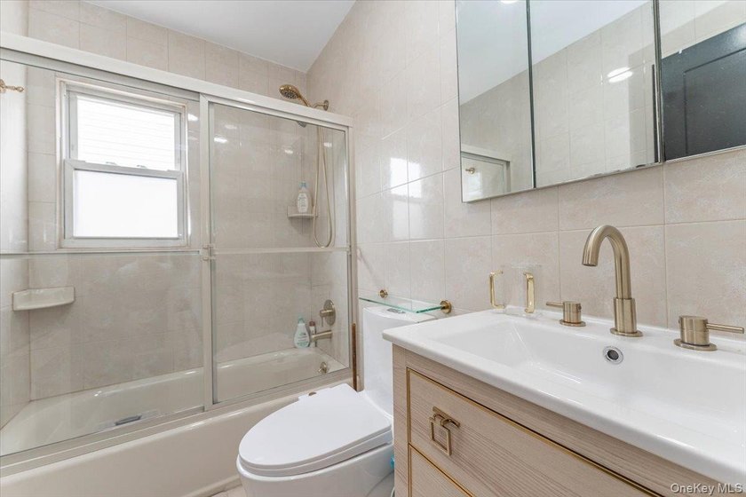 Welcome to this stunning 6-bedroom, 3.5-bath home on a beautiful - photo 15