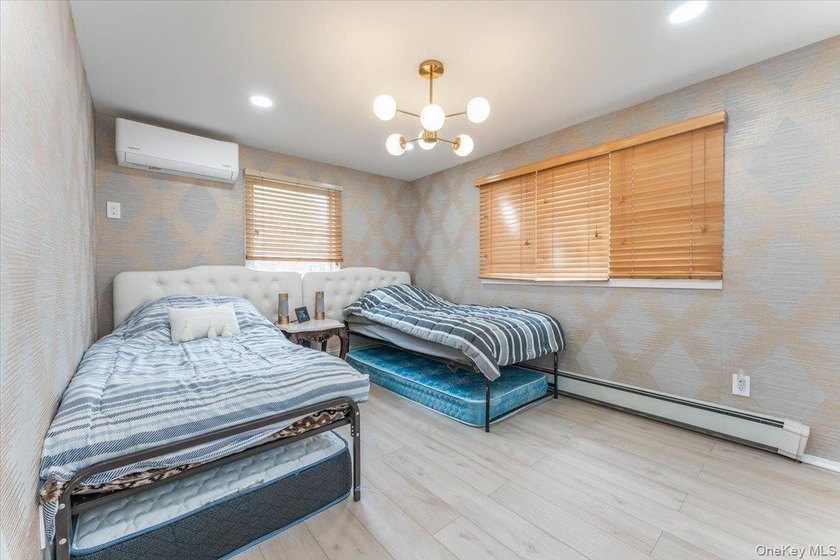 Welcome to this stunning 6-bedroom, 3.5-bath home on a beautiful - photo 17
