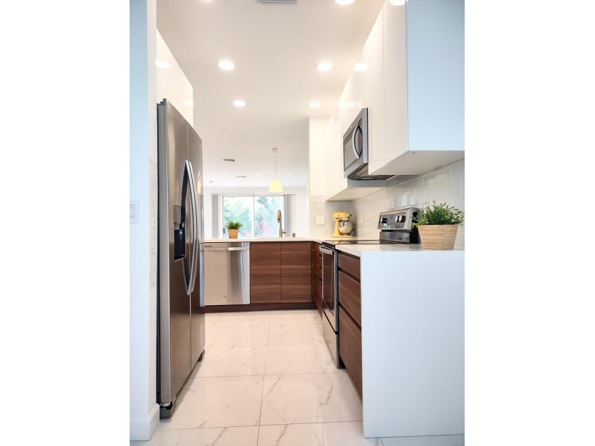 Fully renovated, bright and modern two-story home in the heart - photo 3