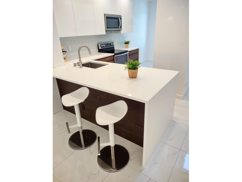 Fully renovated, bright and modern two-story home in the heart - photo 8