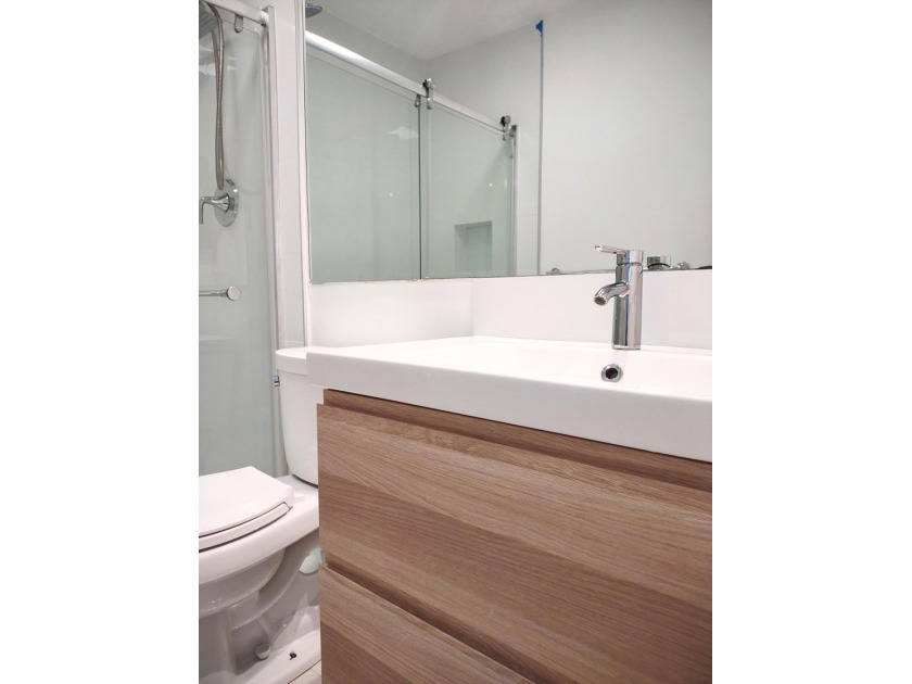 Fully renovated, bright and modern two-story home in the heart - photo 10