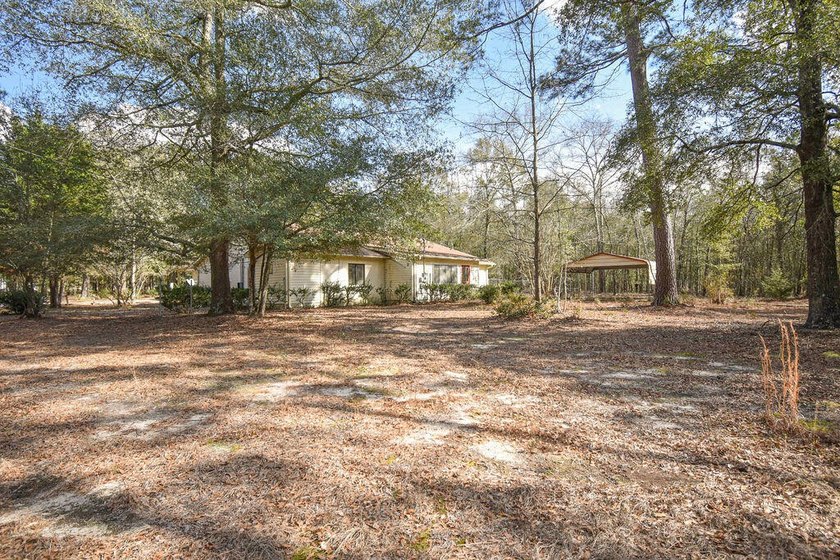 Flexible Zoning! Positioned on 5 picturesque acres, this - photo 31