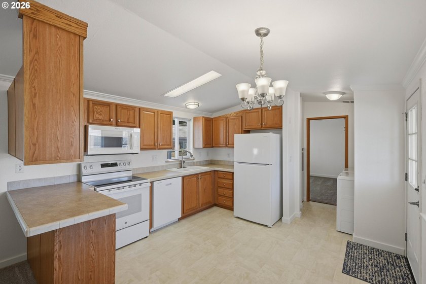 Beautifully updated home in a desirable all-age park! This - photo 3