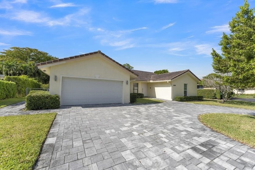 This stunning 4-bedroom, 2-bath pool home in the heart of Coral - photo 3