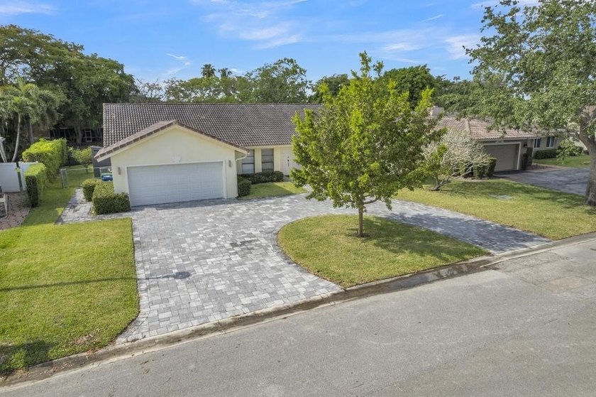 This stunning 4-bedroom, 2-bath pool home in the heart of Coral - photo 5