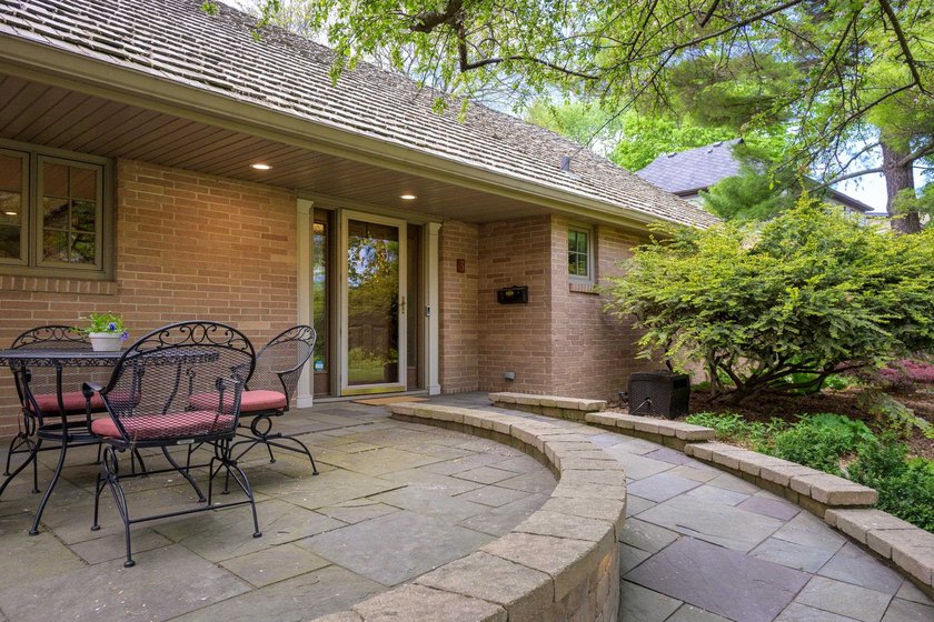 OPEN HOUSE CANCELED! Tucked into a beautiful village setting - photo 3