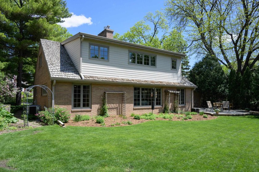OPEN HOUSE CANCELED! Tucked into a beautiful village setting - photo 5