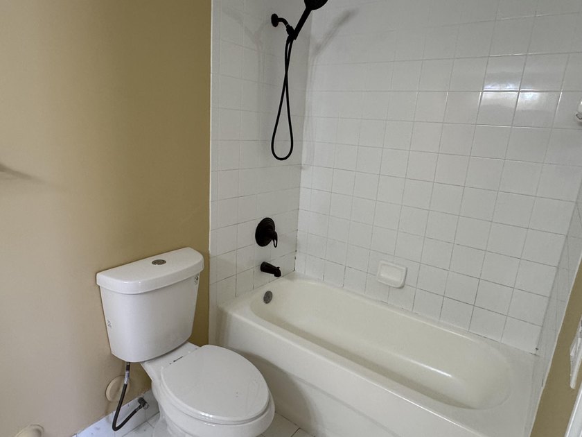 NEWLY RENOVATED KITCHEN. UPDATED BATHROOMS. NEW WINDOW - photo 9