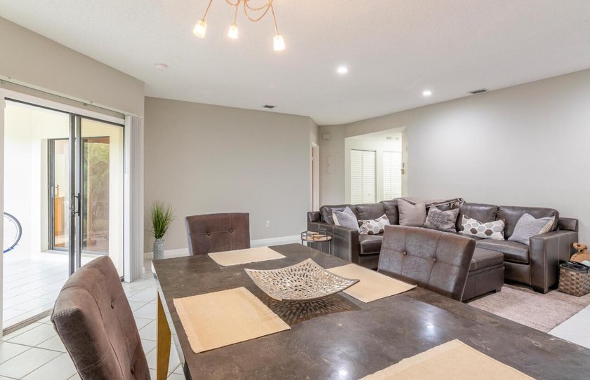 This 2 bedroom 2 bath condo offers the ease of first floor - photo 4