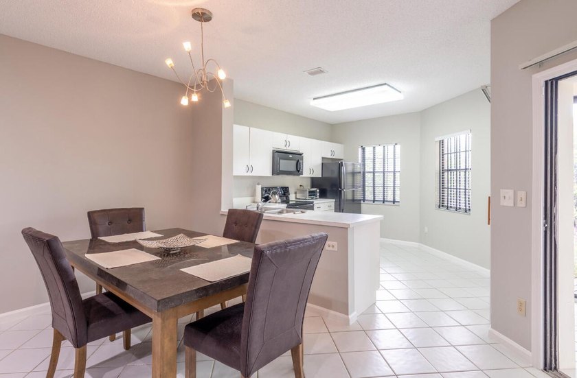 This 2 bedroom 2 bath condo offers the ease of first floor - photo 6