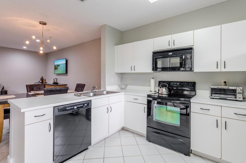 This 2 bedroom 2 bath condo offers the ease of first floor - photo 8