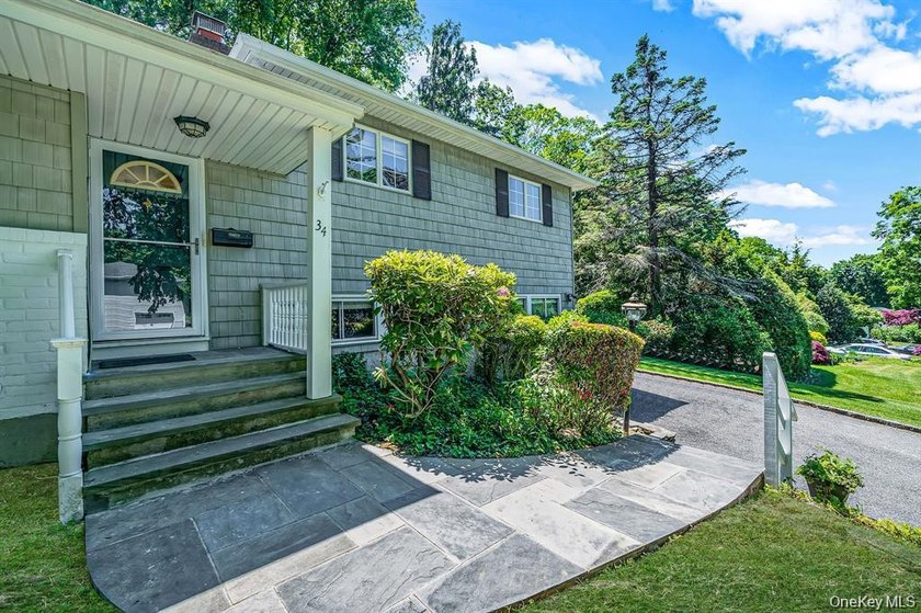 Welcome to 34 Grist Mill Ln. located in the desirable Halesite - photo 4