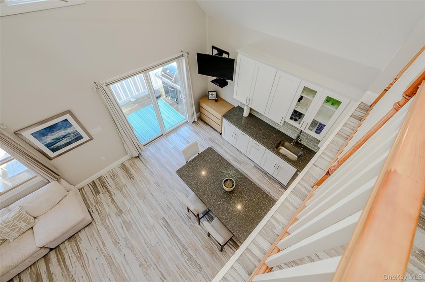 Welcome to this Pristine, Renovated, FEMA-Compliant Coastal - photo 12