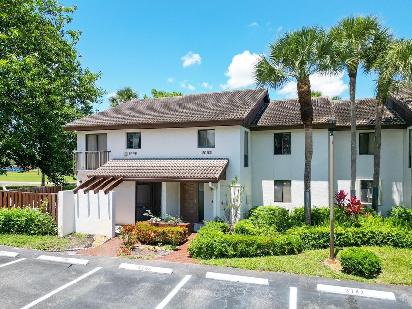 Welcome to this beautifully maintained two-story condominium in - photo 2