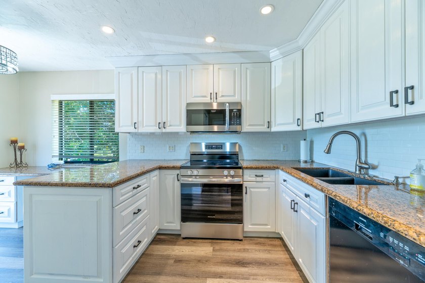 Welcome to this beautifully maintained two-story condominium in - photo 5