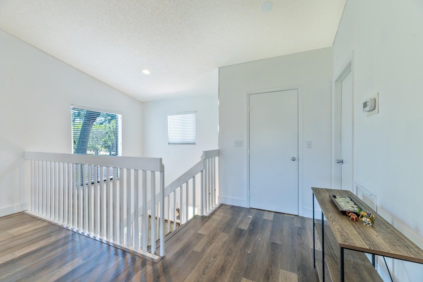 Welcome to this beautifully maintained two-story condominium in - photo 10