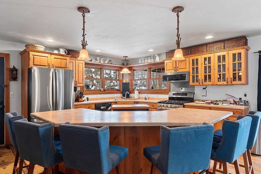 Escape to the Northwoods with this inviting half-log home on - photo 5