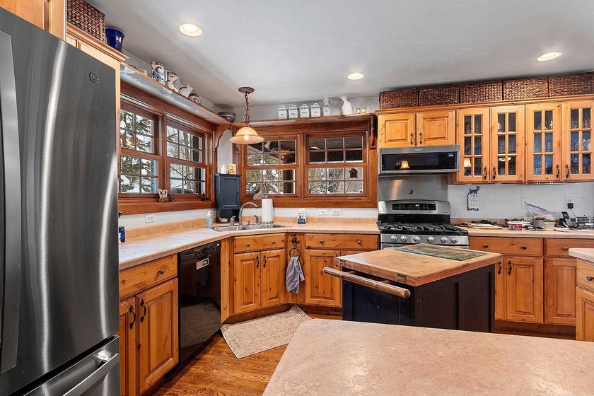 Escape to the Northwoods with this inviting half-log home on - photo 7