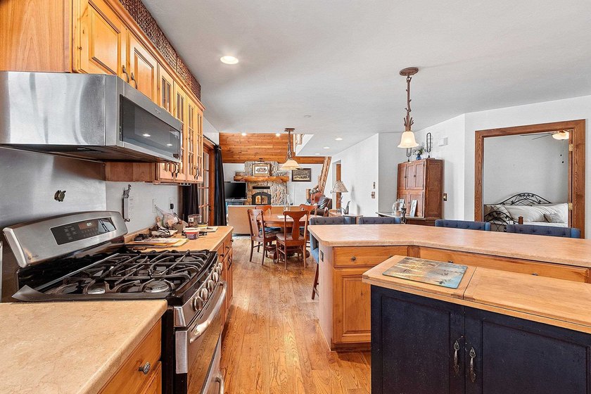 Escape to the Northwoods with this inviting half-log home on - photo 9