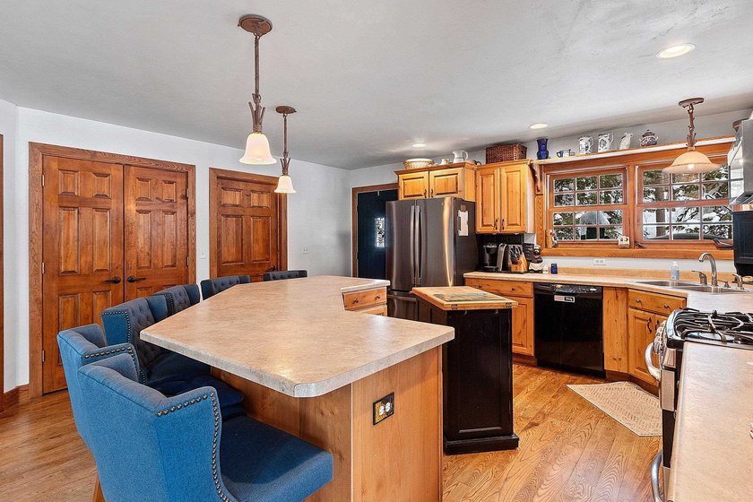Escape to the Northwoods with this inviting half-log home on - photo 10