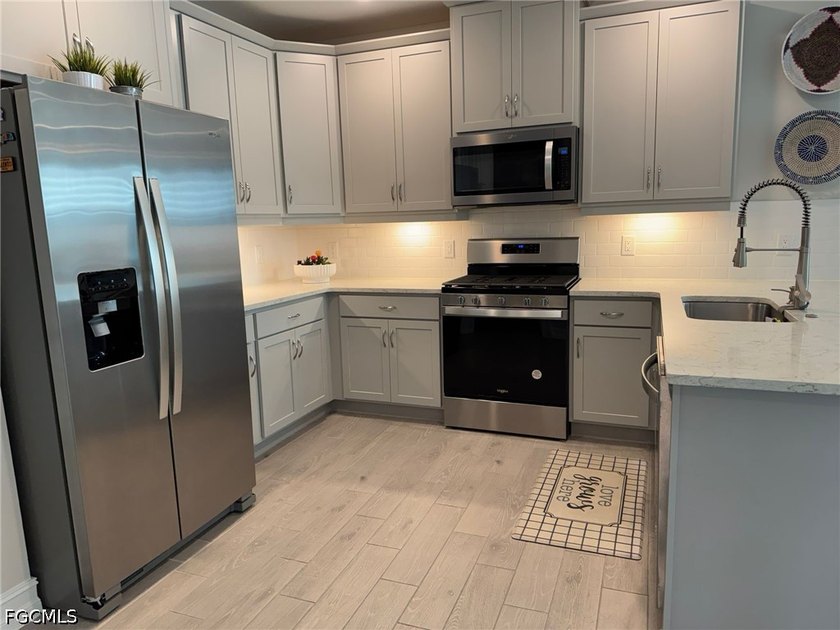 Skip the wait for new construction and step into this - photo 4