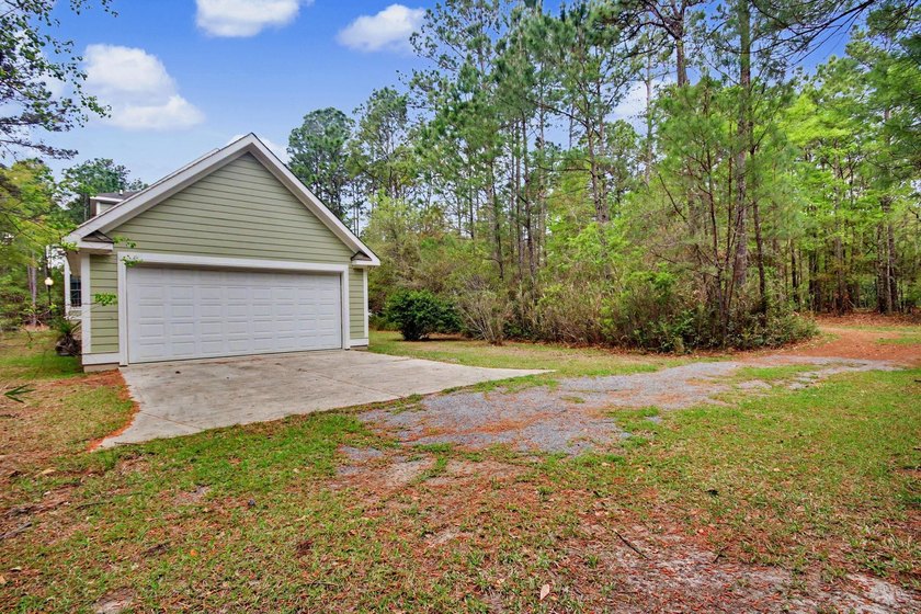 Step into timeless Lowcountry elegance at this beautifully - photo 50