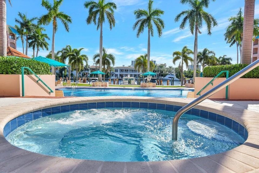 Best Waterfront Value in Mizner Village! Discover one of the - photo 2