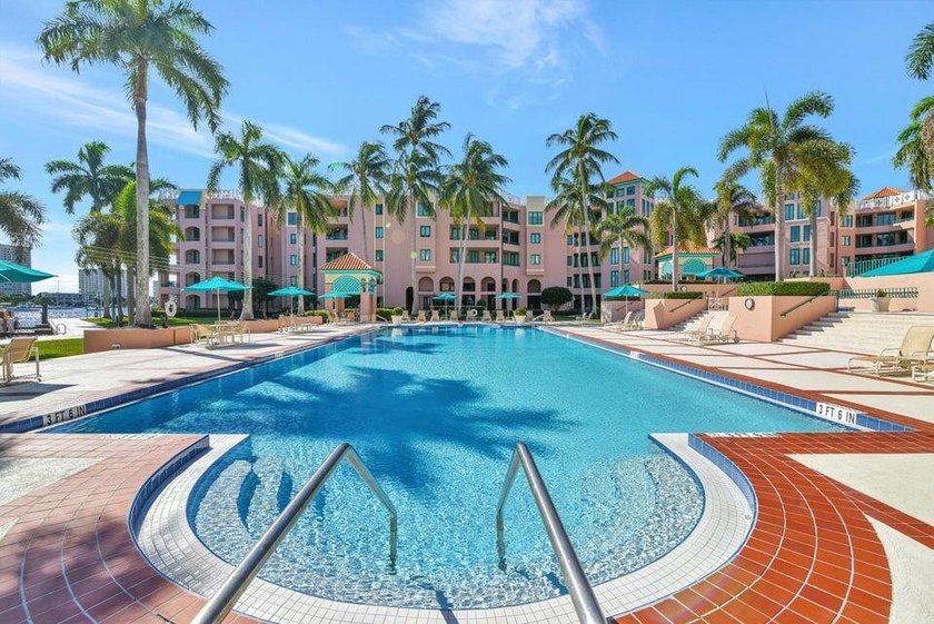 Best Waterfront Value in Mizner Village! Discover one of the - photo 4