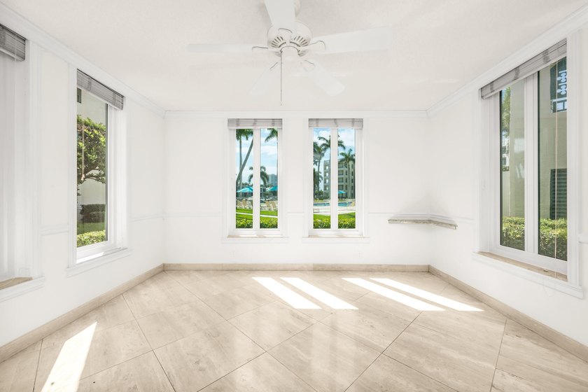 Best Waterfront Value in Mizner Village! Discover one of the - photo 8