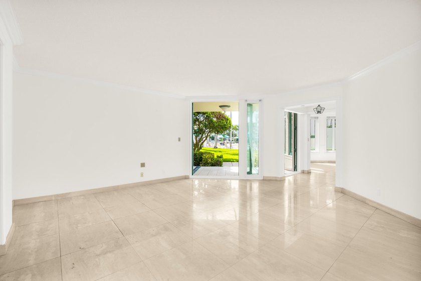 Best Waterfront Value in Mizner Village! Discover one of the - photo 9