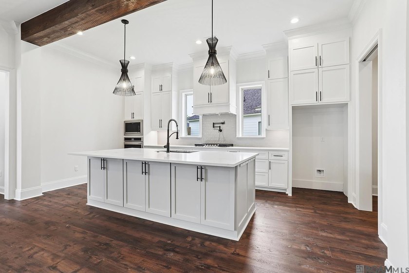 Welcome to this beautifully designed 4-bedroom, 3-bath home in - photo 2