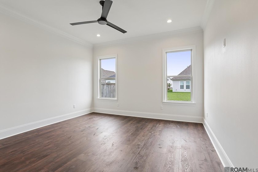 Welcome to this beautifully designed 4-bedroom, 3-bath home in - photo 5